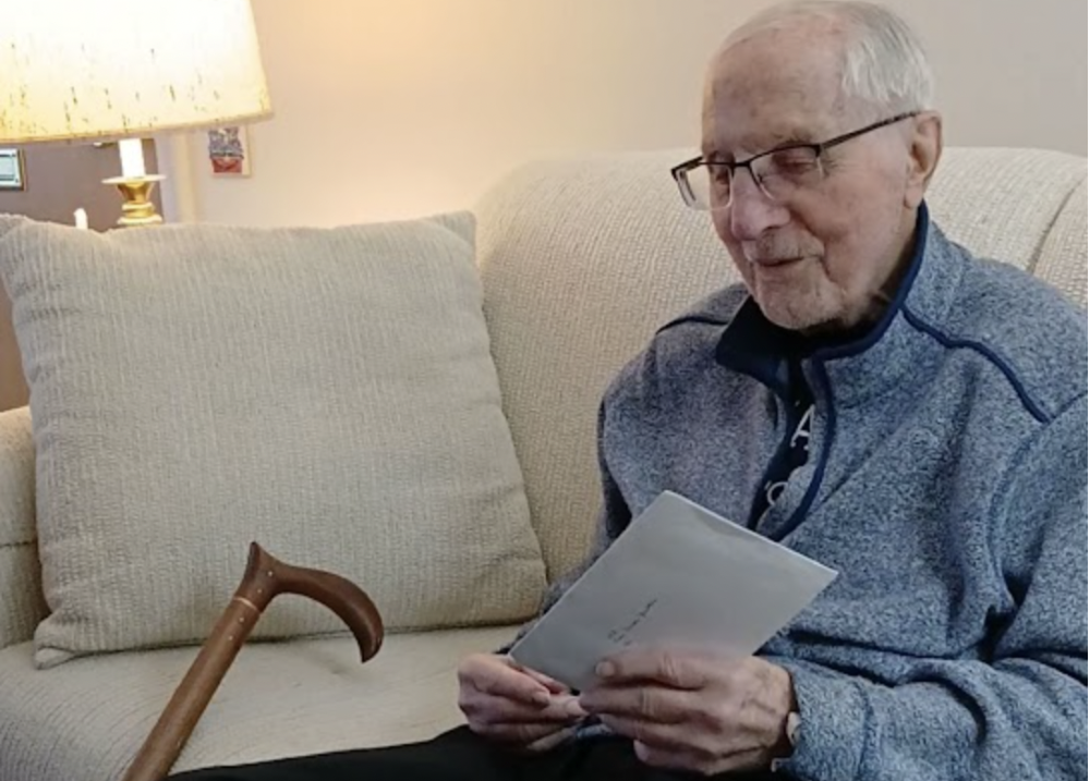 Bishop Thomas Gumbleton holds a letter from Pope Francis on Jan. 26.