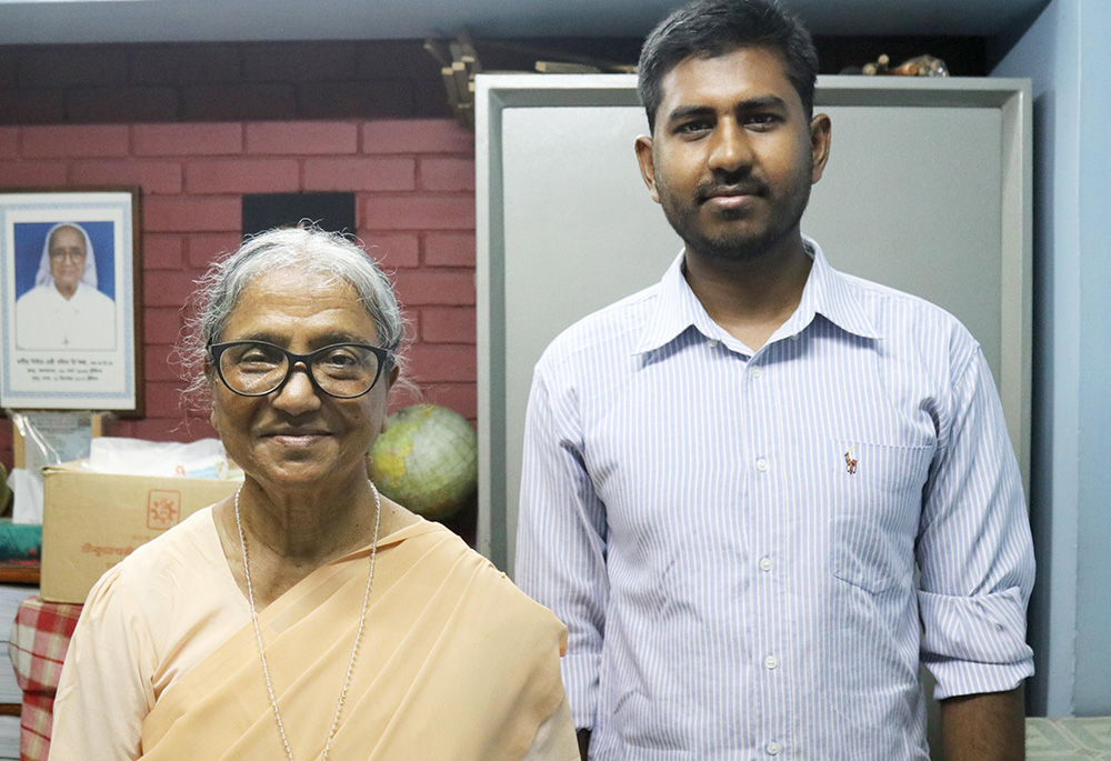 Mohammad Rabbi Ali, 25, a former student who graduated from Green Herald Evening Charity School, is pictured with his teacher Sr. Lourdes Mary Rozario. (Stephan Uttom Rozario)