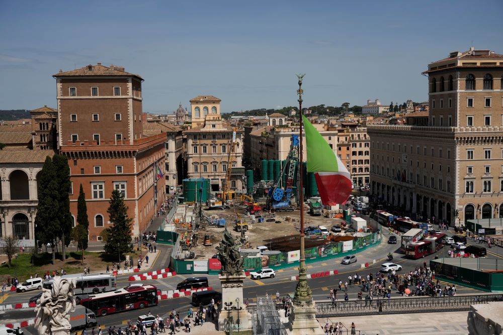 For the next four years at least, central Piazza Venezia and its Imperial Forum-flanked boulevard to the Colosseum are scheduled to be congested and blighted by giant, 14-meter high green silos that are needed for theonstruction site of a major underground hub in central Piazza Venezia in Rome May 9. (AP/Alessandra Tarantino)