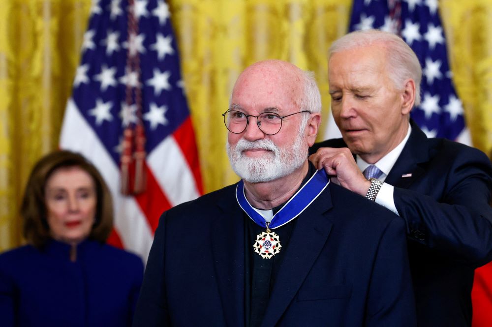 U.S. President Joe Biden presents the Presidential Medal of Freedom to Jesuit Fr. Greg Boyle during a ceremony at the White House in Washington May 3.