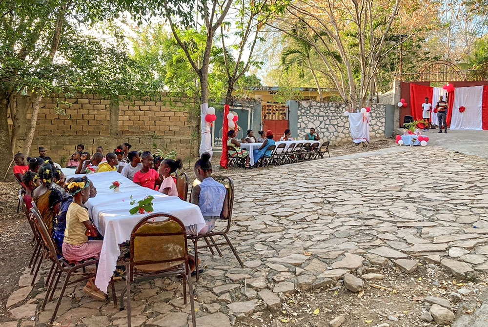 Haitian children of the Eucharistic Youth Movement attend a party organized by Mary-Jo Desir, a Haitian postulant with the Religious of Jesus and Mary. (Patricia Dillon)