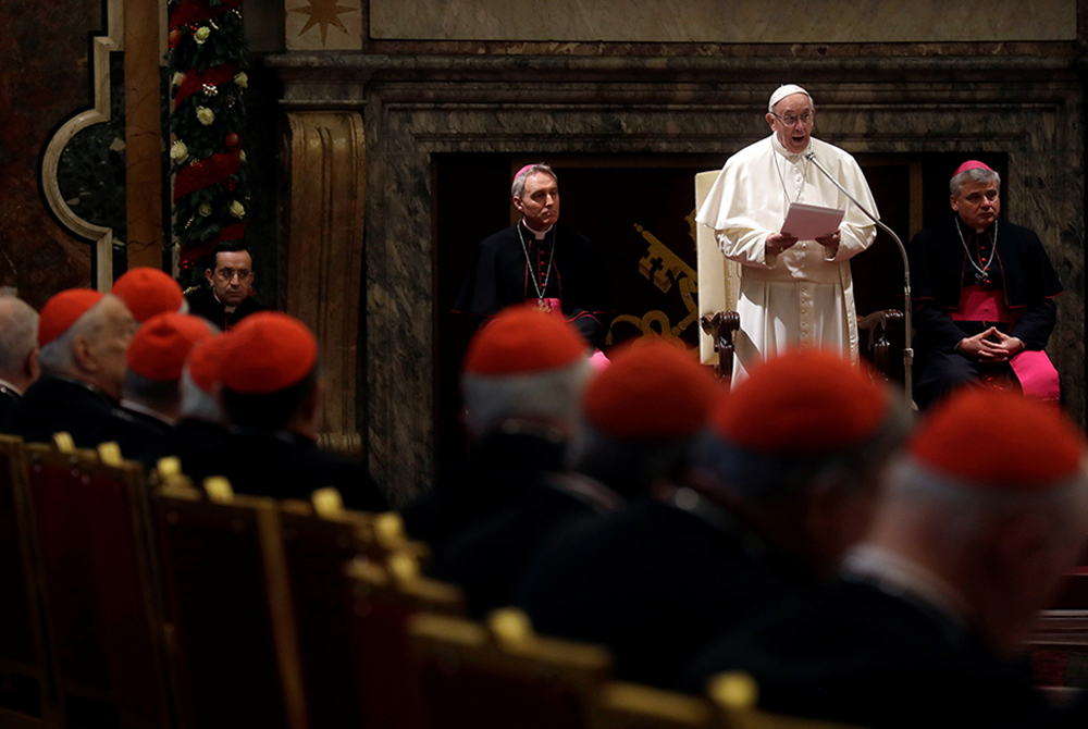 Pope Francis speaks during the traditional greetings to the Roman Curia in the Sala Clementina (Clementine Hall) of the Apostolic Palace, at the Vatican, on Dec. 22, 2016. (AP/Gregorio Borgia, Pool)