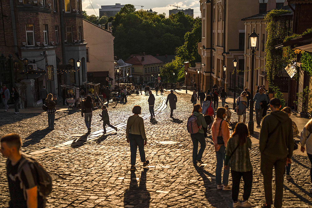 Pedestrians walk along a popular street in Kyiv, Ukraine, April 27. (AP/Francisco Seco)