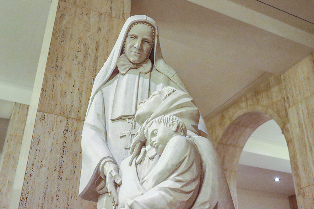 A statue of St. Frances Xavier Cabrini, patroness of immigrants, is seen in the Basilica of the National Shrine of the Immaculate Conception in Washington, D.C. Cabrini is the subject of one of two documentaries created by Jerome Bongiorno and Marylou Tibaldo-Bongiorno, now streaming on PBS.org. (NCR photo/Teresa Malcolm)