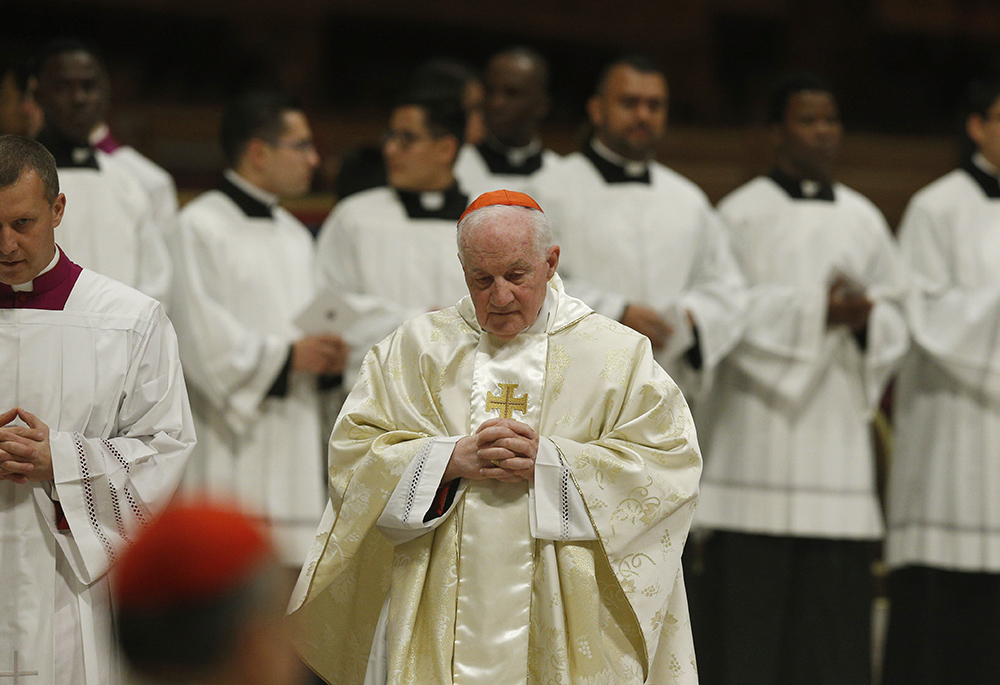 Cardinal Marc Ouellet, prefect of the Dicastery for Bishops, attends Pope Francis' celebration of Mass marking the feast of Our Lady of Guadalupe in St. Peter's Basilica Dec. 12, 2022, at the Vatican. (CNS/Paul Haring)