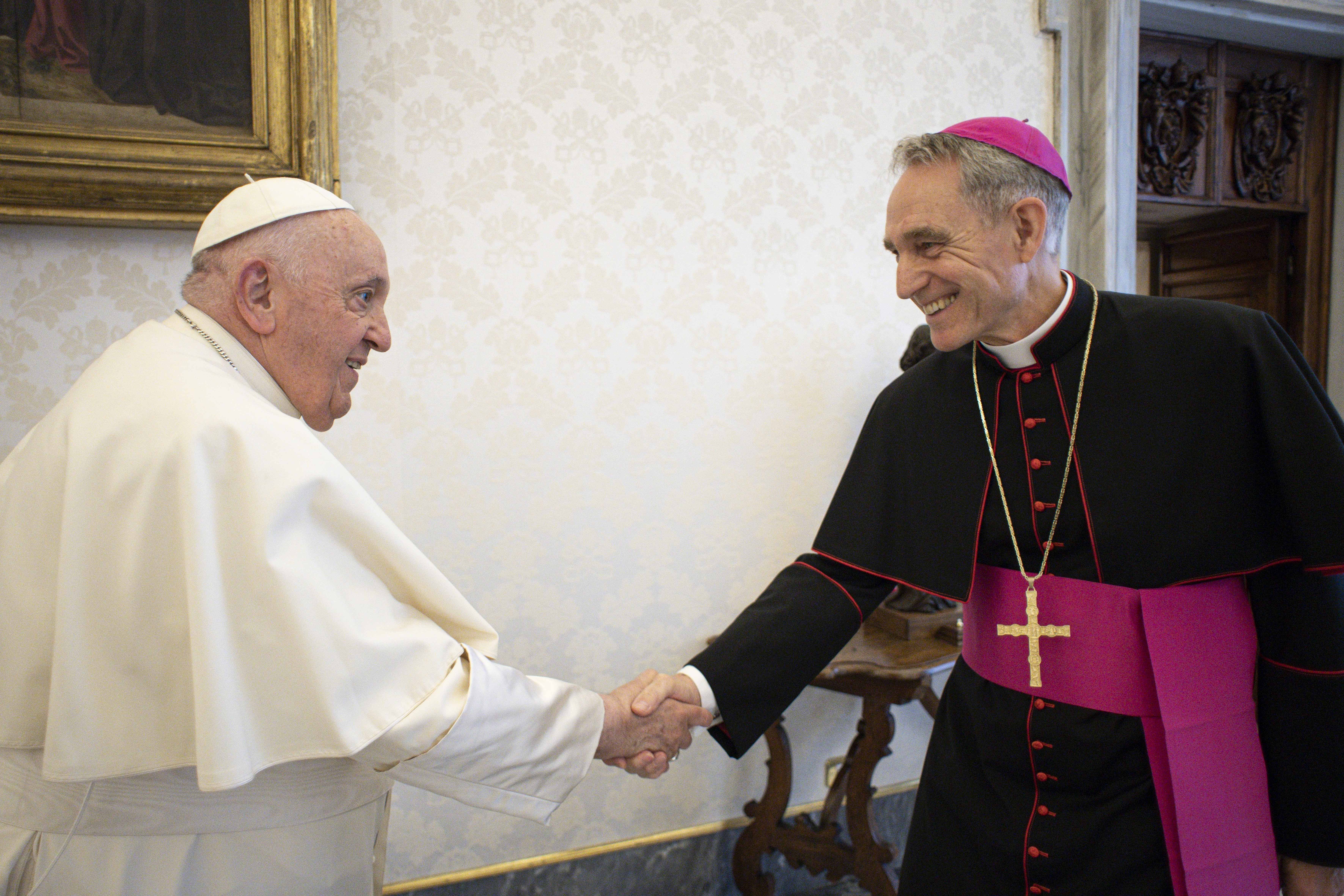 Pope Francis meets Archbishop Georg Gänswein, personal secretary to the late Pope Benedict XVI, in the library of the Apostolic Palace at the Vatican in this May 19, 2023, file photo. Pope Francis has directed Archbishop Gänswein to return to his home diocese of Freiburg in southwest Germany without an assignment by July 1. (CNS photo/Vatican Media)