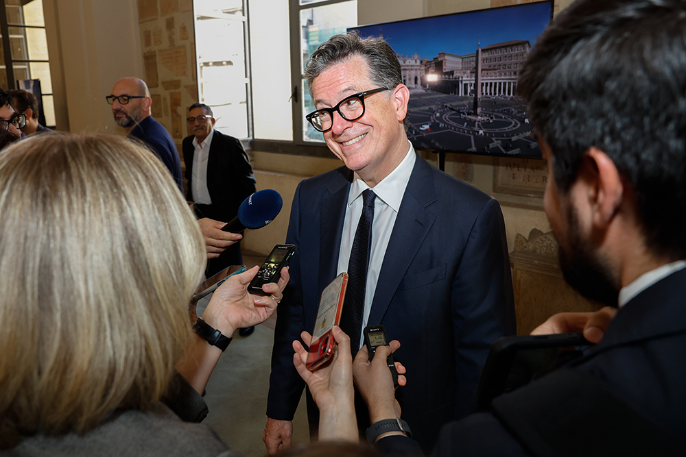 U.S. comedian and writer Stephen Colbert speaks with reporters in the Lapidary Gallery of the Apostolic Palace, part of the Vatican Museums, after meeting Pope Francis during an audience June 14, 2024. (CNS/Lola Gomez)