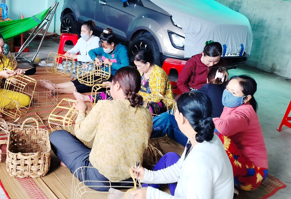 Survivors of human trafficking and other women make bamboo and rattan products for a living at a church-run house Apr. 24, 2023, in Vietnam's Quang Tri province. (Joachim Pham)