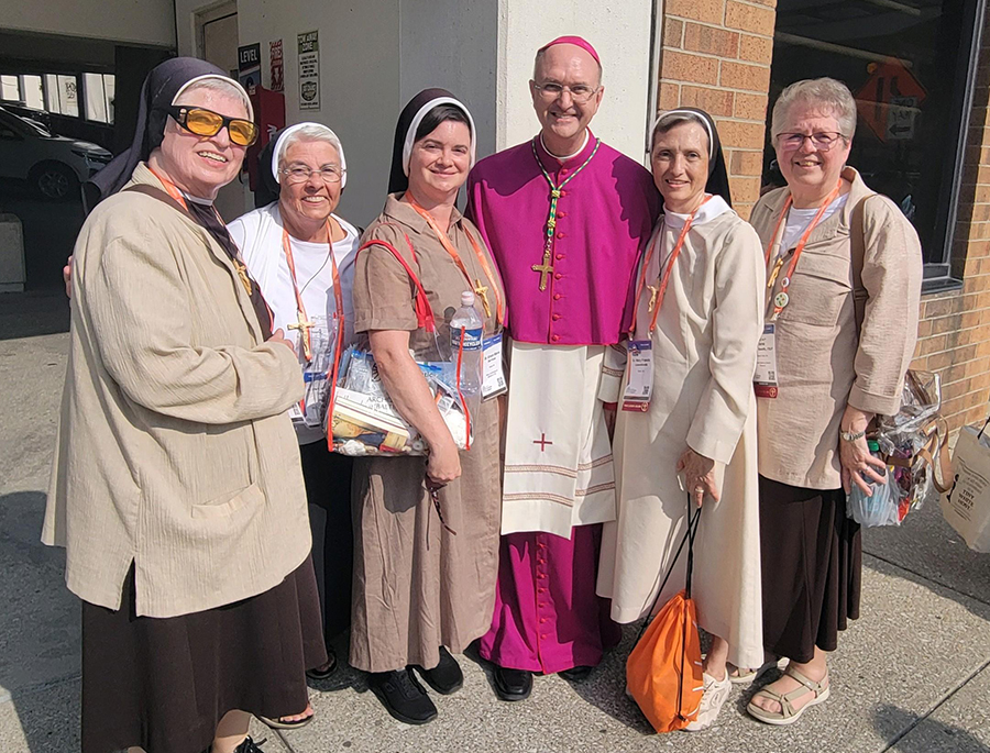 Felican Sisters of North America are pictured with Auxiliary Bishop Bruce Lewandowski of Baltimore at the National Eucharistic Congress in Indianapolis. From left: Sr. Melanie Marie Bajorek; Sr. Bernadette Kapfer; Sr. Grace Marie Del Priore; Lewandowski; Sr. Mary Francis Lewandowski; and Sister Jane Mary Gawlik (Courtesy of Grace Marie del Priore)