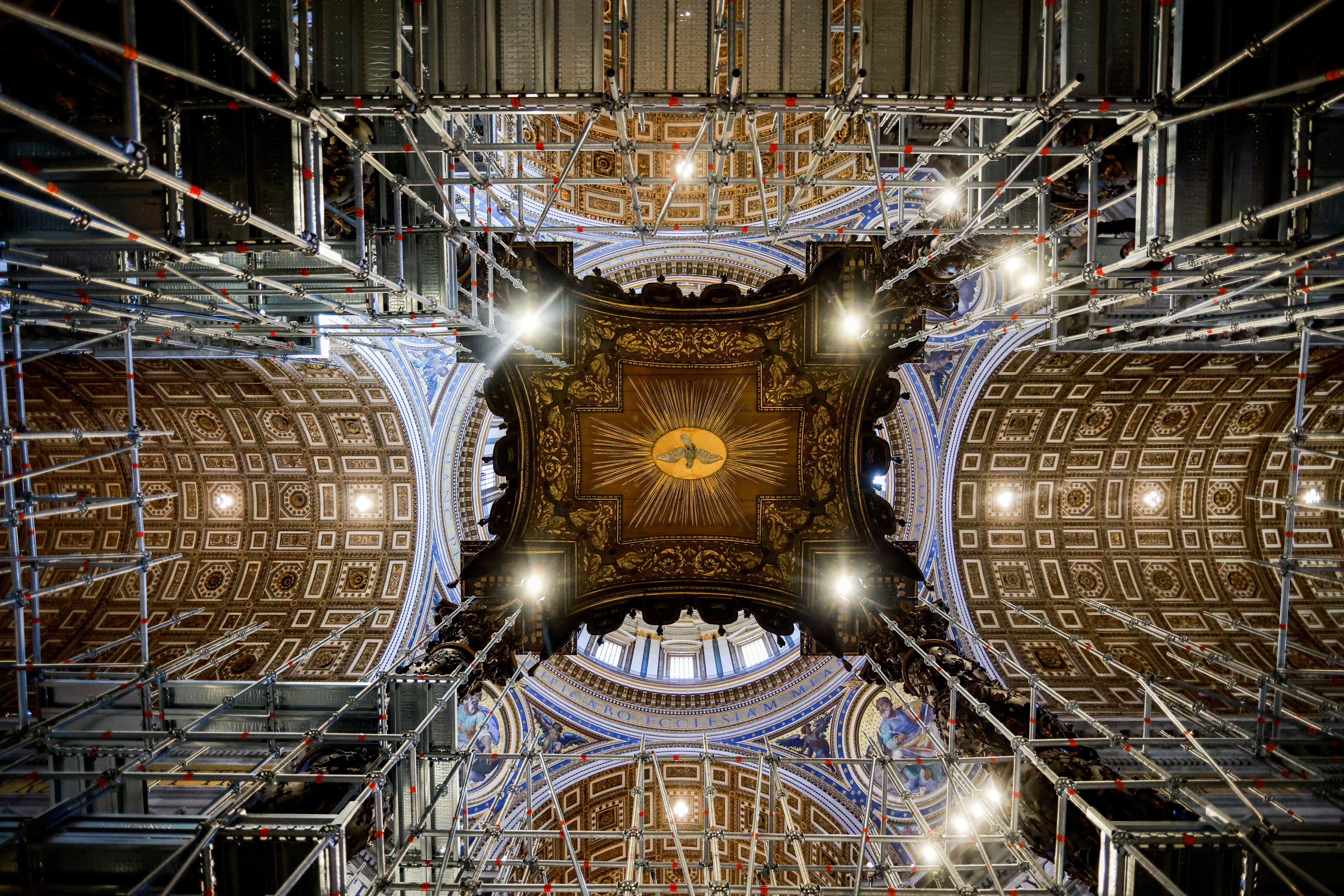 Canopy of baldachin seen from below with scaffolding. 