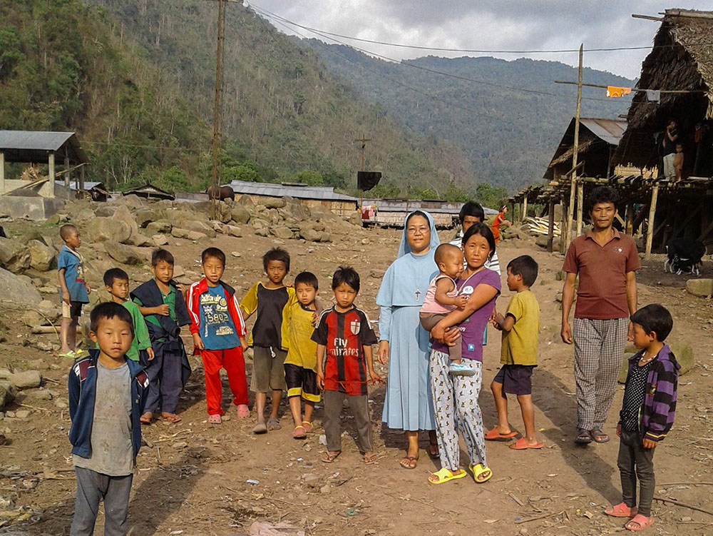 Sr. Christine Mynsong with a group of children during a visit to Tato, Shi Yomi District, Itanagar, Arunachal Pradesh, India (Courtesy of Missionary Sisters of Mary Help of Christians)