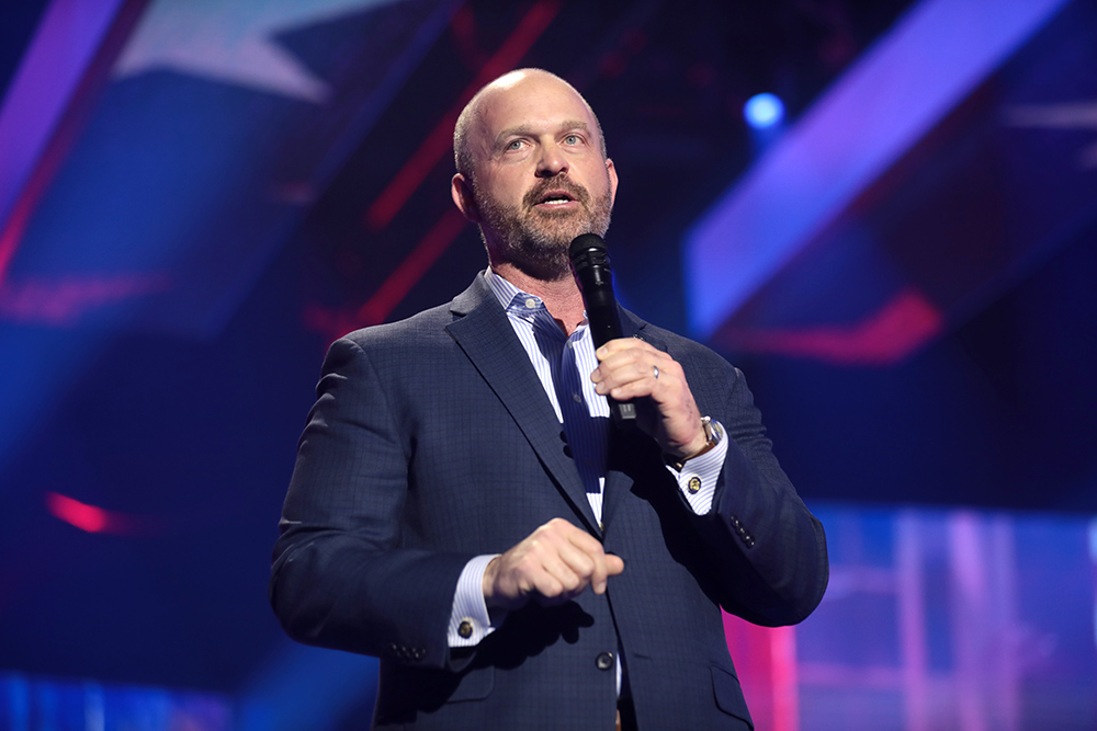 Kevin Roberts, president of the Heritage Foundation, speaks with attendees at Turning Point USA's AmericaFest in Phoenix in December 2022. (Flickr/Gage Skidmore)