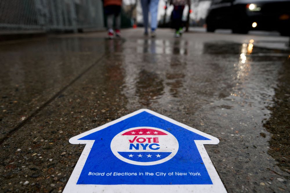 A sign directs people to vote in the New York Presidential Primary election in New York City April 2. (