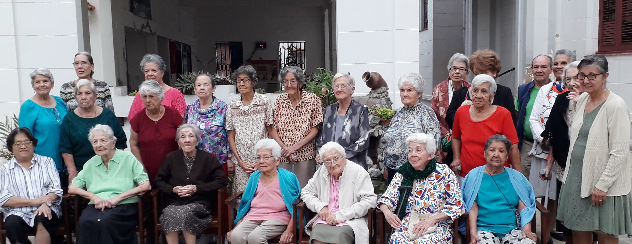 A group of elder residents are pictured at the Siervas de San José Home for the Elderly in Havana, Cuba. (Courtesy of Siervas de San José Home for the Elderly)