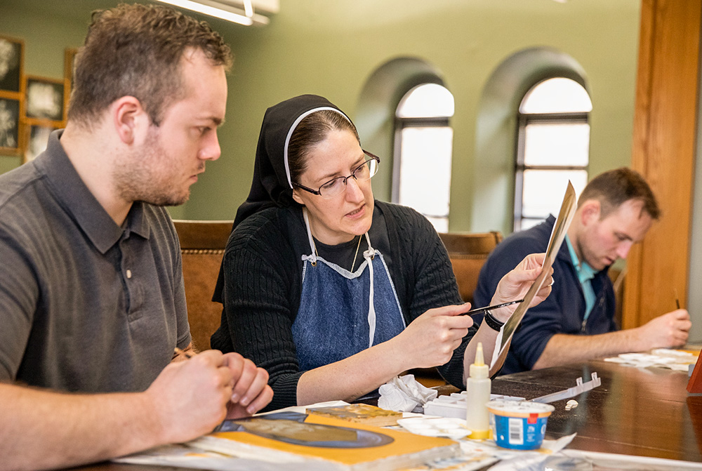 Benedictine Sr. Jeana Visel instructs propaedeutic-year seminarians in icon painting at St. Meinrad Seminary and School of Theology in Indiana. (Krista Hall)