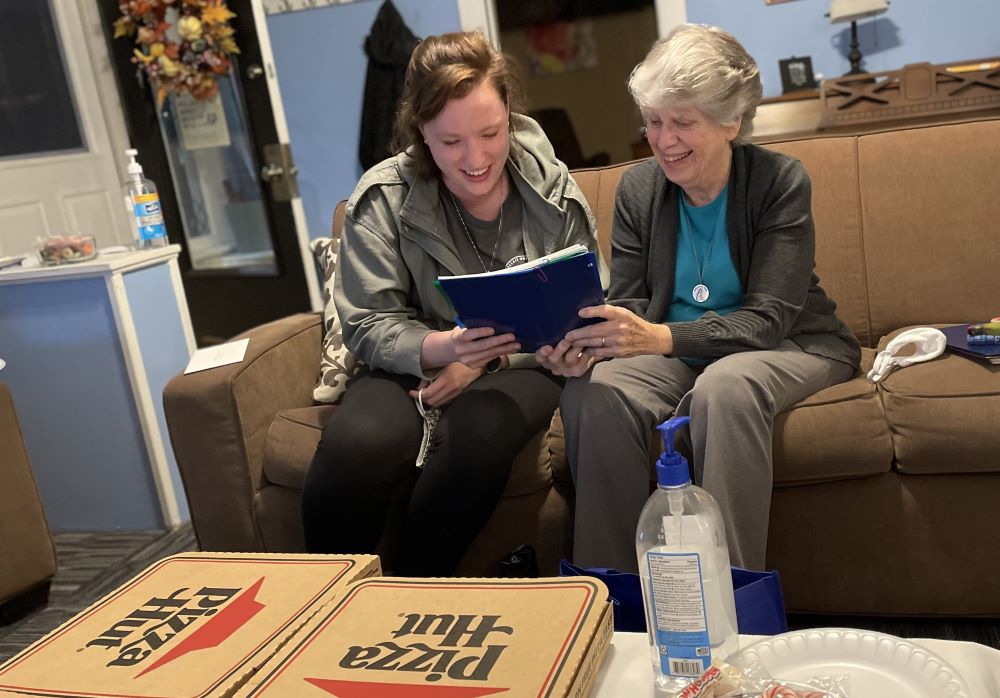 Sr. Mary Ann Spangler shares a moment with a retreat participant.