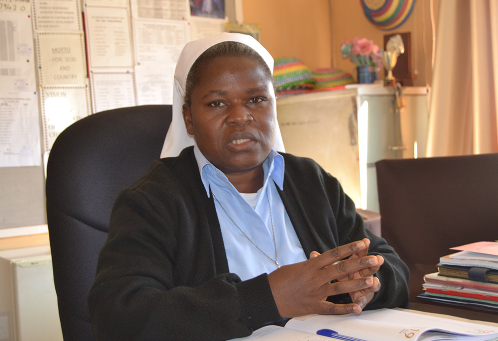 Sr. Bibian Mbao, head teacher of Holy Cross Girls Secondary School, is pictured in her office. (Derrick Silimina)