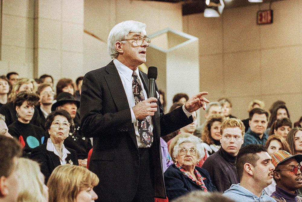 Phil Donahue hosts his television show in New York on Jan. 27, 1993. Donahue, whose pioneering daytime talk show launched an indelible television genre, died Aug. 18. He was 88. (AP/Mark Lennihan, File)