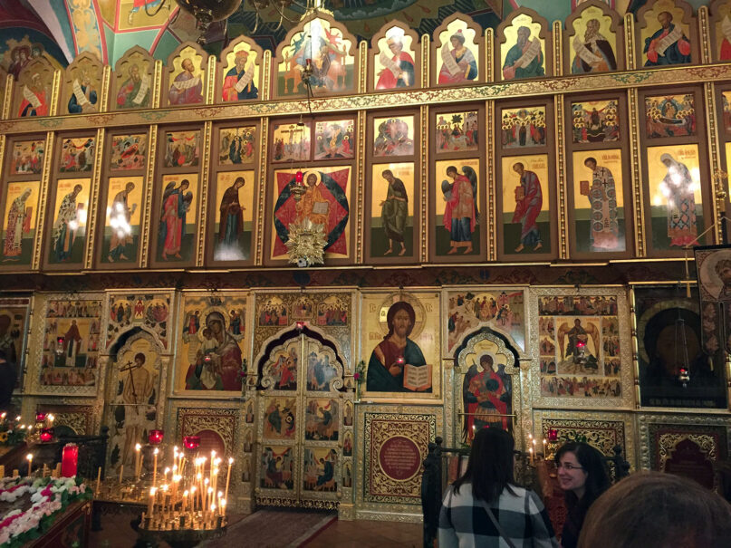 Large, ornate, rood-screen covered in icons. 