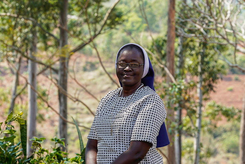 Sr. Monica Ichife stands in front of the community garden in Konzalendo, Malawi, on Sept. 26, 2023. (Courtesy of Monica Ichife)