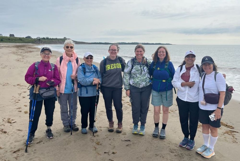 Sr. Mary Frolich stands with a group of women at Hirtle's Beach, Nova Scotia.