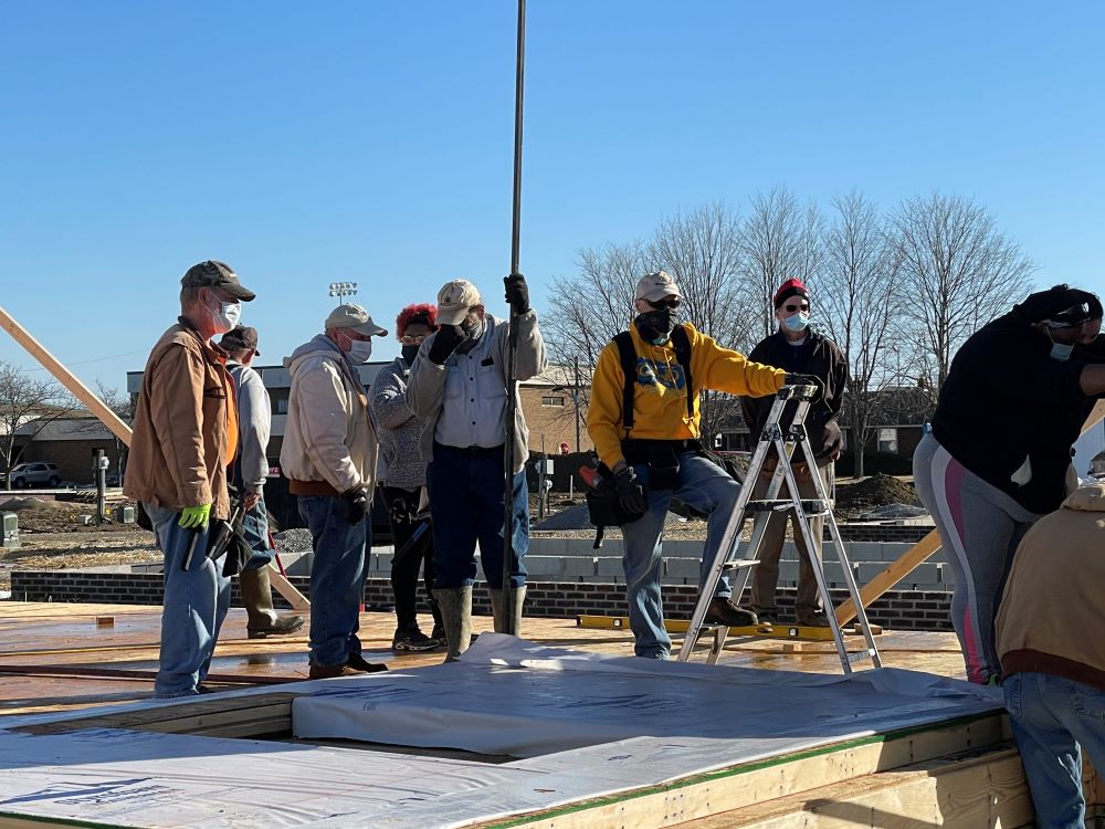 Construction workers at house site