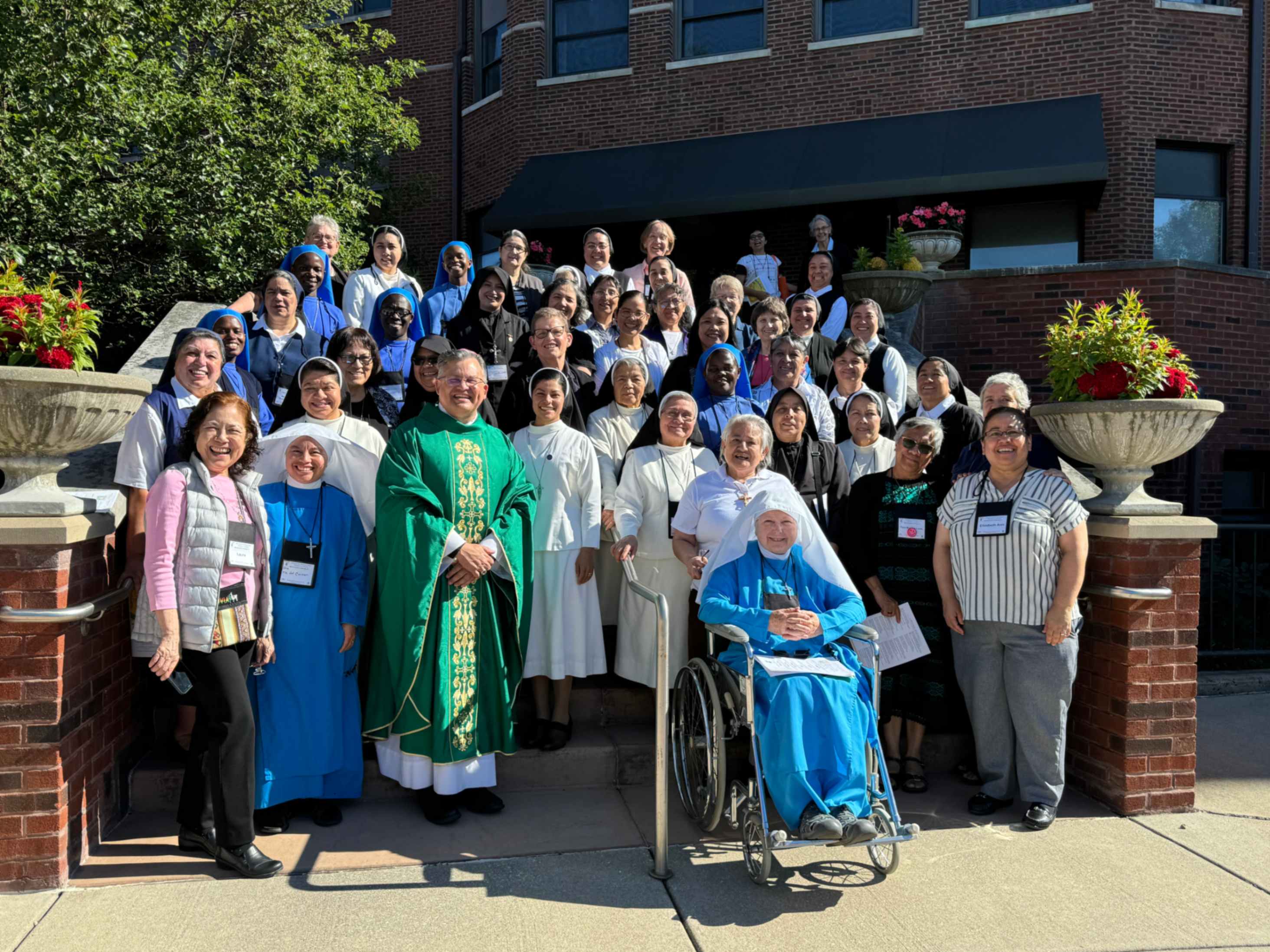 Sisters at a Labor Day gathering of the Association of Latin American Missionary Sisters in the United States pose for a group photo Sept. 2 at Chicago's Mother of Good Counsel Convent. 