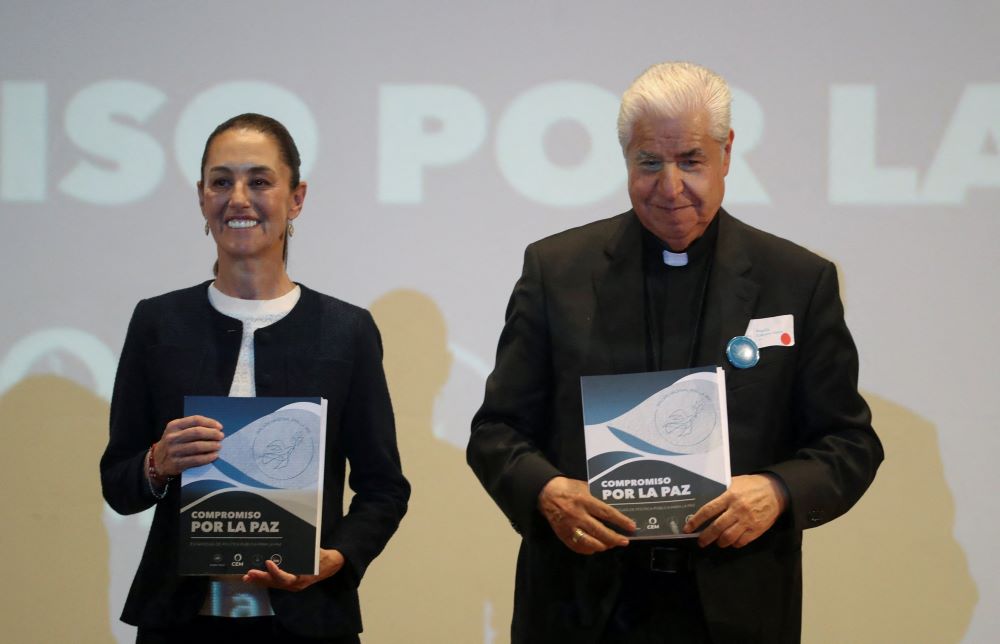 Then-presidential candidate Claudia Sheinbaum of Mexico appears with Archbishop Rogelio Cabrera López of Monterrey March 11 during an event in Mexico City to sign a peace commitment.