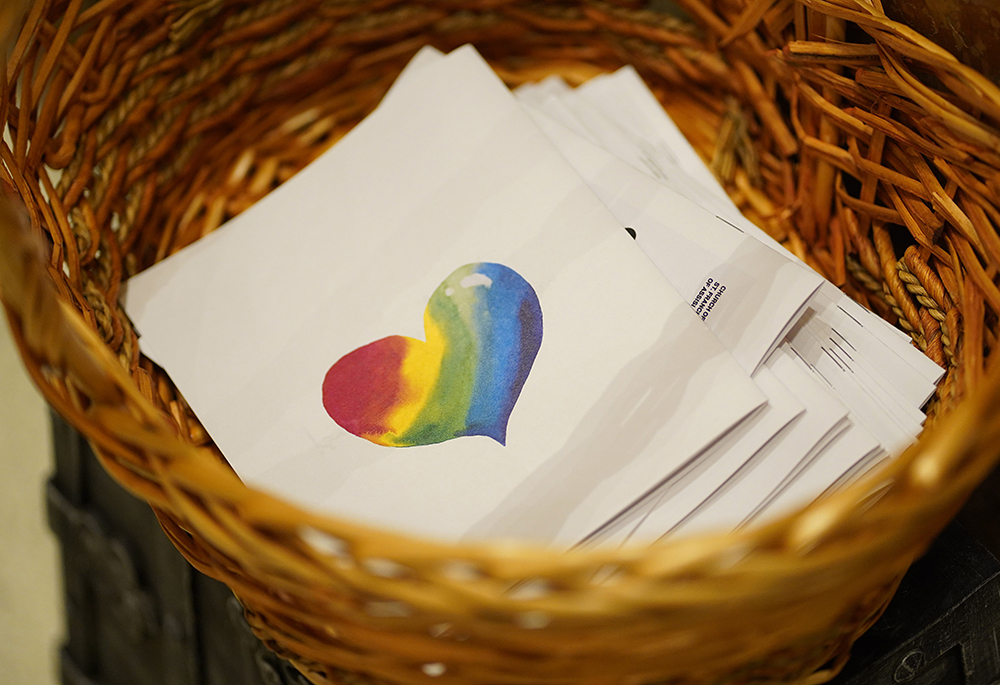 Programs are seen in a basket prior to the annual "Pre-Pride Festive Mass" at St. Francis of Assisi Church in New York City, on June 29, 2024. The liturgy, hosted by the parish's LGBT+ ministry, is traditionally celebrated on the eve of the city's Pride parade. (OSV News/Gregory A. Shemitz)