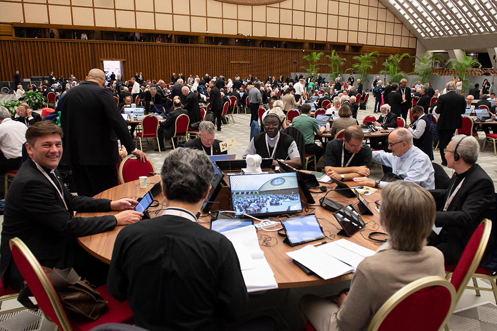 Archbishop Timothy Broglio of the U.S. Archdiocese for the Military Services sits at one of the English-language tables during the Synod of Bishops on synodality in the Paul VI Audience Hall at the Vatican Oct. 22, 2024. (CNS/Vatican Media)