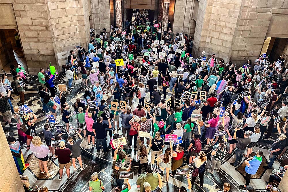 Hundreds of people gather at the Nebraska Capitol to protest a proposed abortion ban, in Lincoln on May 16, 2023. This year, Nebraska has two abortion-related ballot initiatives — one seeking to block abortion rights, the other to add it as a constitutional right. (AP/Margery Beck, File)