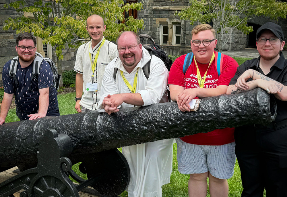 Pictured from left to right are: George White, James Pawlowicz, Br. Christian Matson, and two other fellow members of Matson's informal group for transgender men seeking religious life. (Courtesy of Greg Walton)