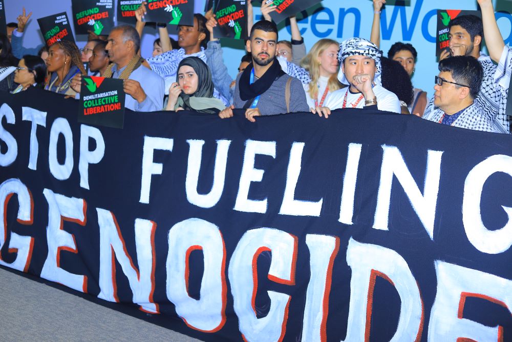 Climate activists demonstrate at the COP29 U.N. climate summit. 