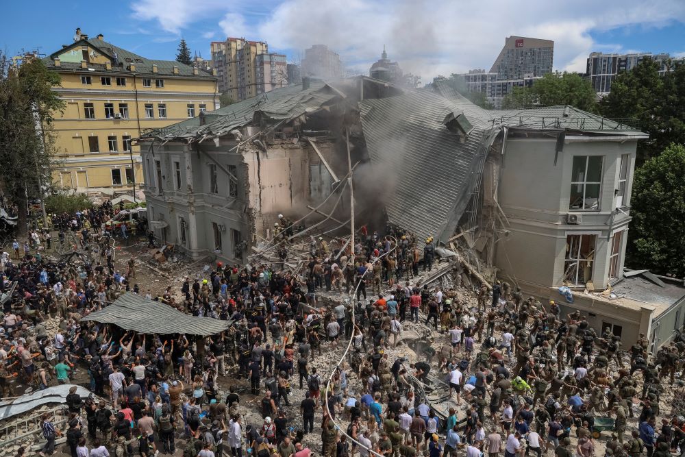 Rescuers work at Okhmatdyt Children's Hospital in Kyiv, Ukraine, after a Russian bomb attack.