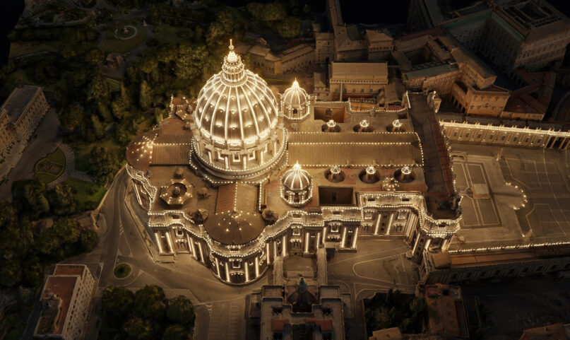 Aerial depiction of St. Peter's outlined with lights.