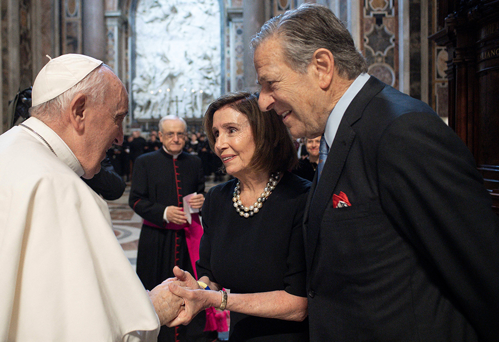 Pope Francis greets then-U.S. House Speaker Nancy Pelosi, D-Calif., accompanied by her husband, Paul, before Mass on the feast of Sts. Peter and Paul in St. Peter's Basilica at the Vatican June 29, 2022. (CNS/Vatican Media via Reuters)