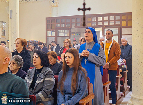 Faithful, including a religious sister, are seen praying in the Holy Family Parish church in Gaza City Dec. 22, 2024. Cardinal Pierbattista Pizzaballa, Latin patriarch of Jerusalem, celebrated Mass during a pre-Christmas visit aiming to bring the joy of the season to the suffering Christian community in the 14th month of Israel-Hamas war. (OSV News/Courtesy of Latin Patriarchate of Jerusalem)