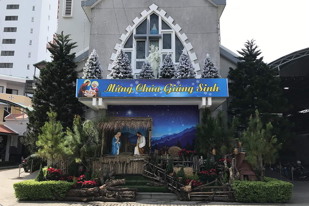 A creche made of grass, wood, bonsais and other used items in front of Bac Thanh Church in Nha Trang, central Vietnam on Dec. 20. (Joachim Pham)