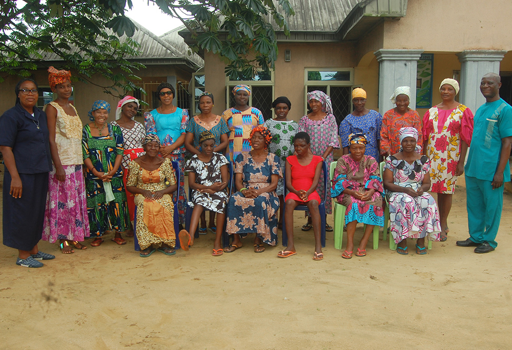 Sr. ElmaMary Ekewuba, a Daughter of Charity of St. Vincent de Paul in Uyo, is pictured with her beneficiaries. (Ayo Omotola)