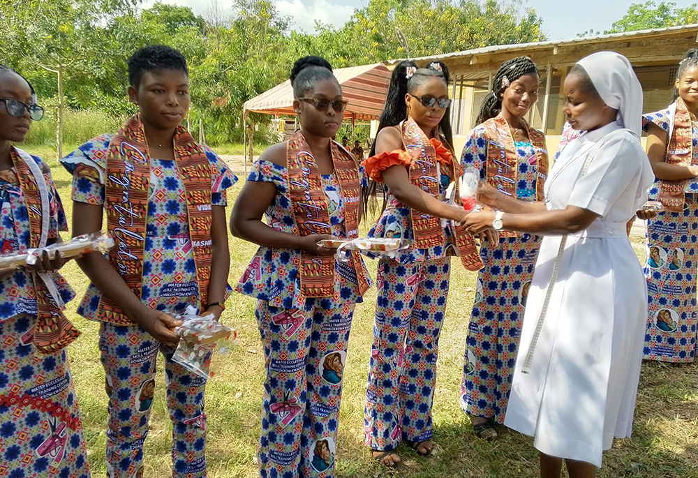 Sr. Francisca Kumevor, the mistress of Mater Ecclesiae Skills Training Centre at Kwaekese, makes presentations to young ladies after the end of their two-year skills training in dressmaking. (Courtesy of Vicariate DEPSOCOM Office)