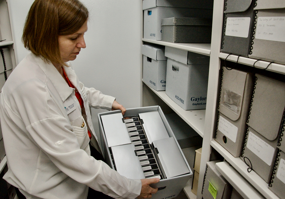 Catherine Lucy, archivist for the Sisters of St. Joseph of Carondelet, shows part of the collection of items used in the 2007 PBS documentary, "Sisters of Selma: Bearing Witness for Change," including about 70 hours of footage shot for the 60-minute movie. (GSR photo/Dan Stockman)