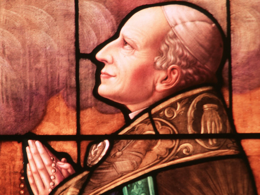 Leo XIII, who served as pope 1878-1903, is depicted in a window at Holy Family Church in Mitchell, South Dakota, in a 1999 file photo. His 1891 encyclical on labor, Rerum Novarum, marks the start of modern Catholic social teaching. (CNS/Crosiers)