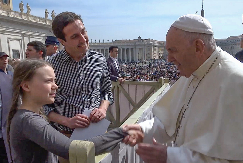 Pope Francis meets 16-year-old climate activist Greta Thunberg on April 17, 2019. (CNS/Vatican Media)