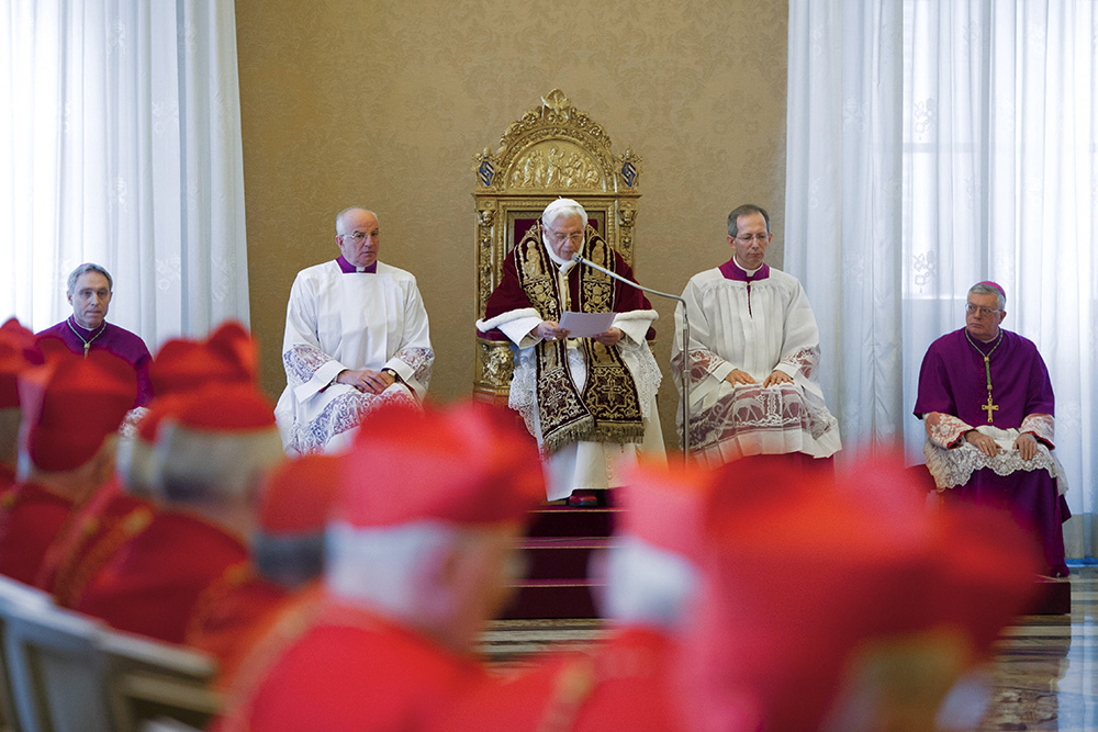 Pope Benedict XVI reads his resignation to a meeting of cardinals at the Vatican Feb. 11, 2013. (CNS/Vatican Media)