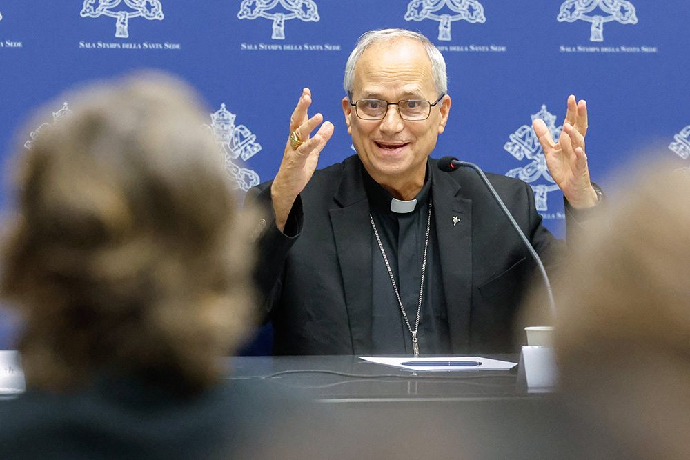 Then-Cardinal Robert Prevost replies to a question from a journalist during a briefing about the assembly of the Synod of Bishops at the Vatican Oct. 25, 2023. (CNS/Lola Gomez)