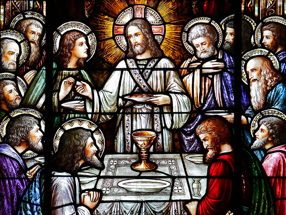 Jesus and his apostles at the Last Supper, depicted in a stained glass window at St. Aloysius Church in Great Neck, New York, in this undated file photo. Today's Gospel comes from Jesus' last discourse, John's record of Jesus' long dinner conversation on the night of his betrayal. (OSV News/Gregory A. Shemitz)
