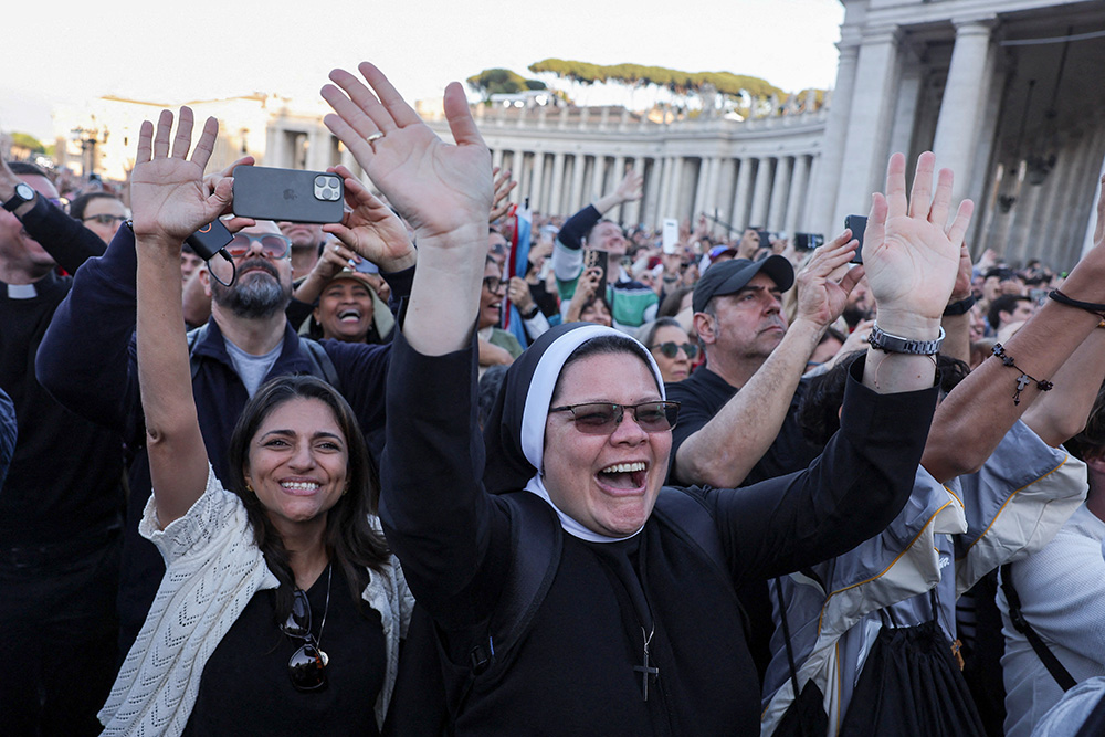 The crowd reacts as Cardinal Robert Prevost, who has chosen the papal name Leo XIV, appears on the central balcony of St. Peter's Basilica at the Vatican May 8, 2025, following his election during the conclave. (OSV News/Reuters/Eloisa Lopez)