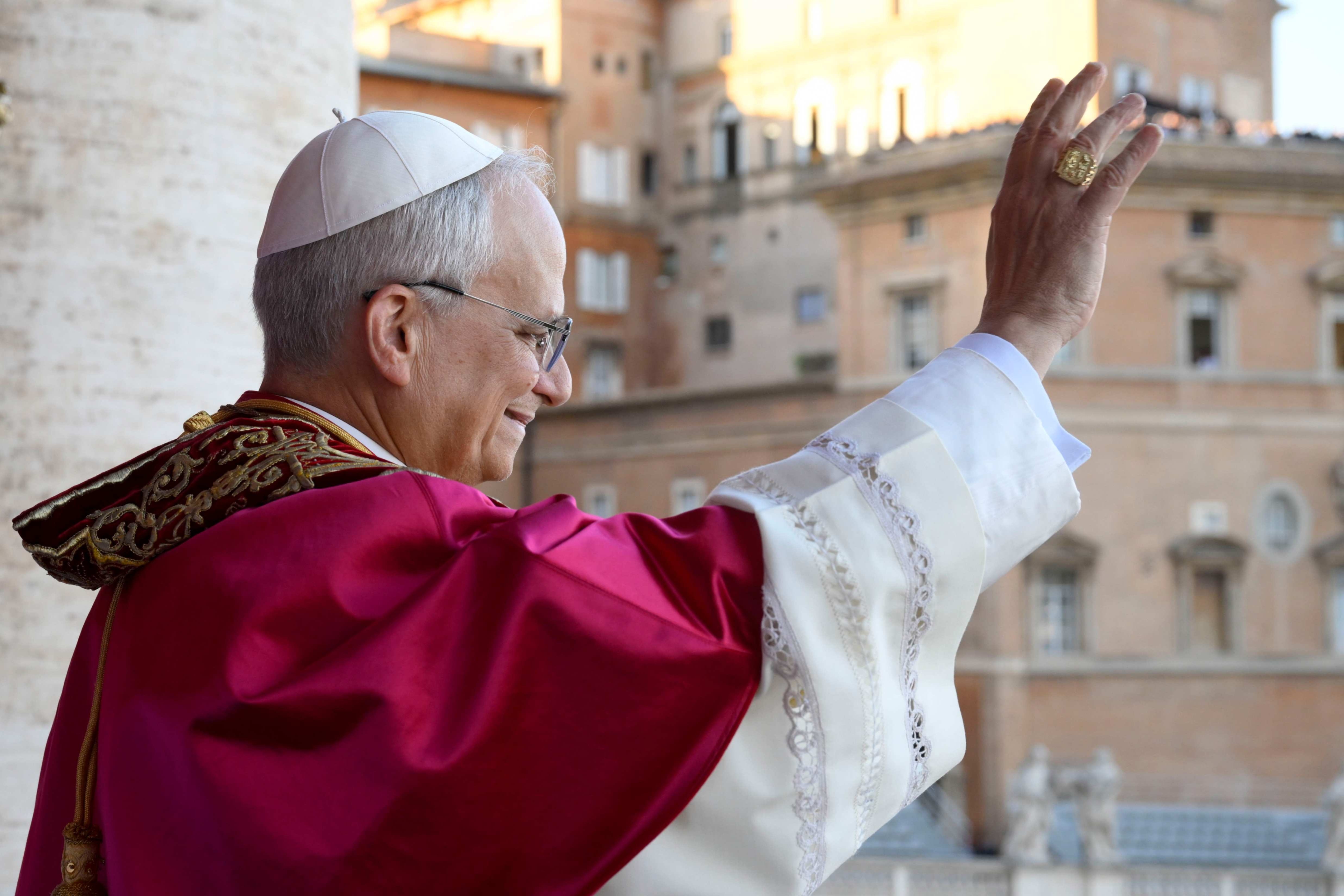 Pope Leo XIV, former Cardinal Robert Prevost, greets the crowd in St. Peter's Square at the Vatican after his election as pontiff on May 8, 2025. The new pope was born in Chicago, United States. (CNS/Vatican Media)