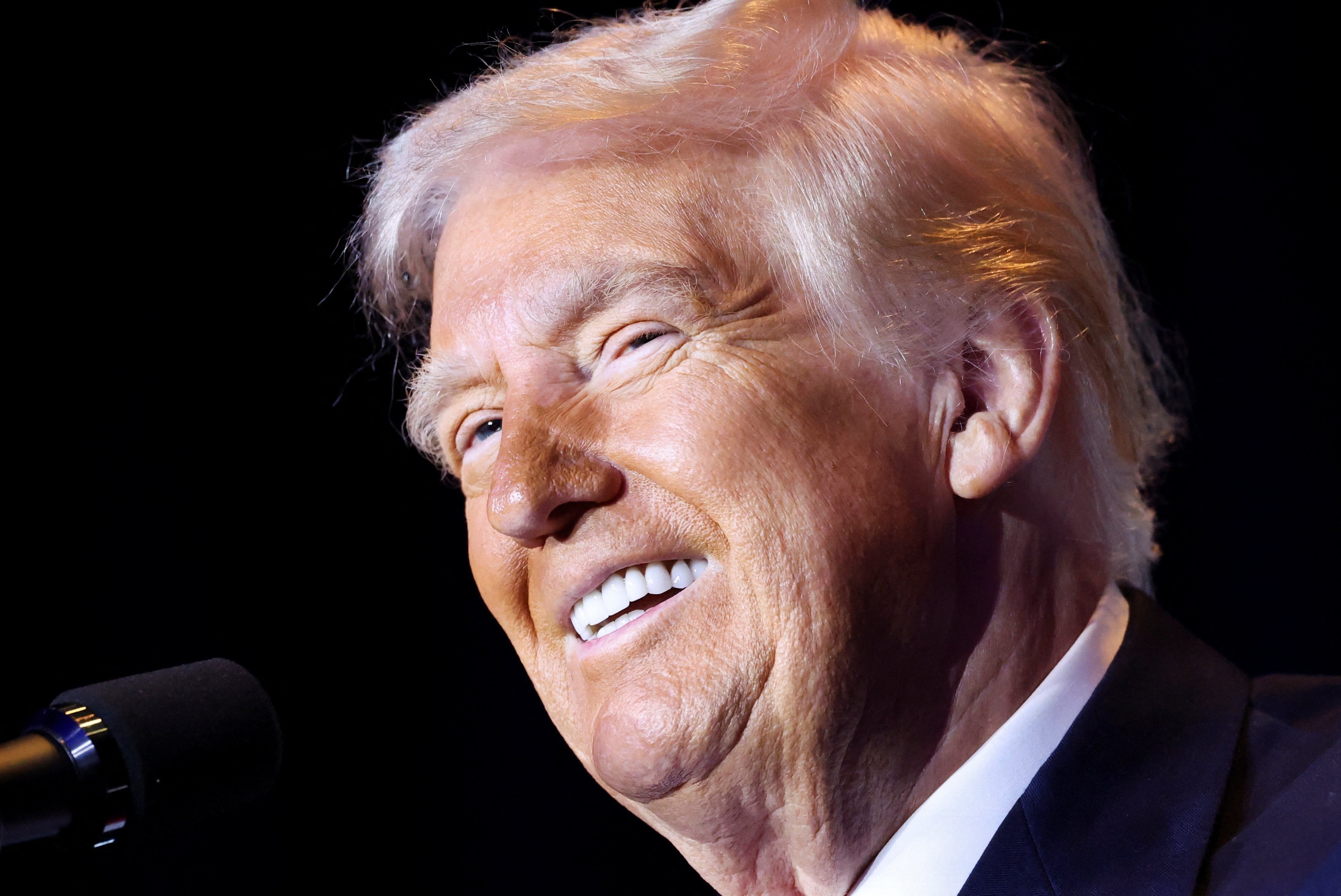 U.S. President Donald Trump smiles as he gives remarks during the annual National Prayer Breakfast at the U.S. Capitol, Feb. 6 in Washington. (OSV News/Reuters/Kevin Lamarque)