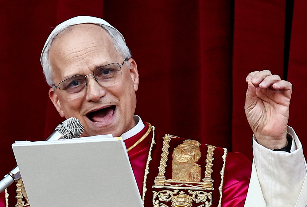 Pope Leo XIV speaks on the central balcony of St. Peter's Basilica at the Vatican May 8, 2025, following his election during the conclave. (OSV News/Reuters/Yara Nardi)